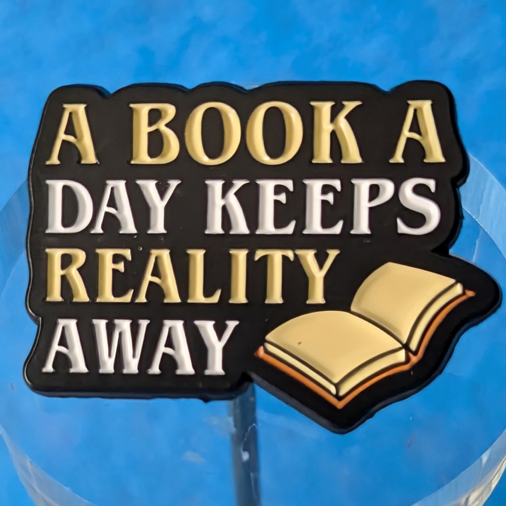 "A Book a Day Keeps Reality Away" Pin